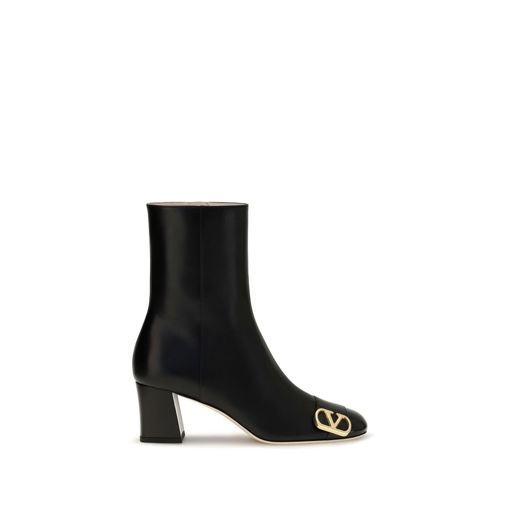 Ankle Boots by Valentino Garavani for women in bos taurus calf leather black showcases a ergonomic silhouette from the V Logo Women's Bos Taurus Calf Leather Ankle Boots collection, featuring a ergonomic block-heel and a ergonomic .