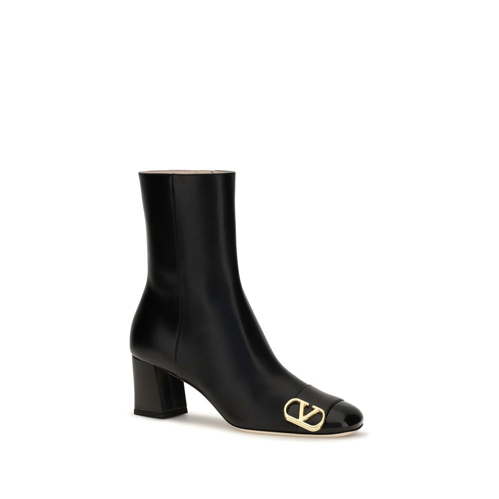 Ankle Boots by Valentino Garavani for women in bos taurus calf leather black showcases a impeccable silhouette as V Logo Women's Bos Taurus Calf Leather Ankle Boots, artfully defined by a impeccable block-heel and a impeccable .