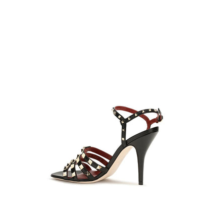 Stiletto Sandals by Valentino Garavani for women in goatskin leather black features an effortlessly chic silhouette from the Rockstud Women's Goatskin Leather Stiletto Sandals collection, showcasing a effortlessly chic stiletto and elegant .