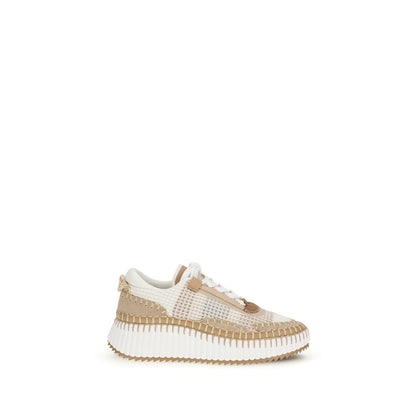 Athletic Sneakers by Chloé for women in nylon polyester & cotton beige & monogram showcases a architectural silhouette, artfully capturing the essence of the Women's Athletic Nylon Polyester & Cotton Sneakers with its signature architectural athletic style construction.