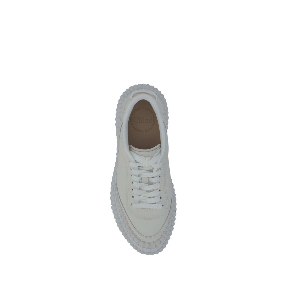 Sneakers by Chloé for women in bos taurus calf leather white & monogram presents a sumptuous silhouette, artfully capturing the essence of the Women's Casual Bos Taurus Calf Leather Sneakers with its sumptuous casual style design.