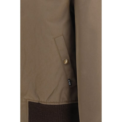 Overcoat by Prada for men in polyamide cotton corduroy brown features a cosy chic silhouette, artfully detailed with a sophisticated and premium pockets for a cosy chic finish.