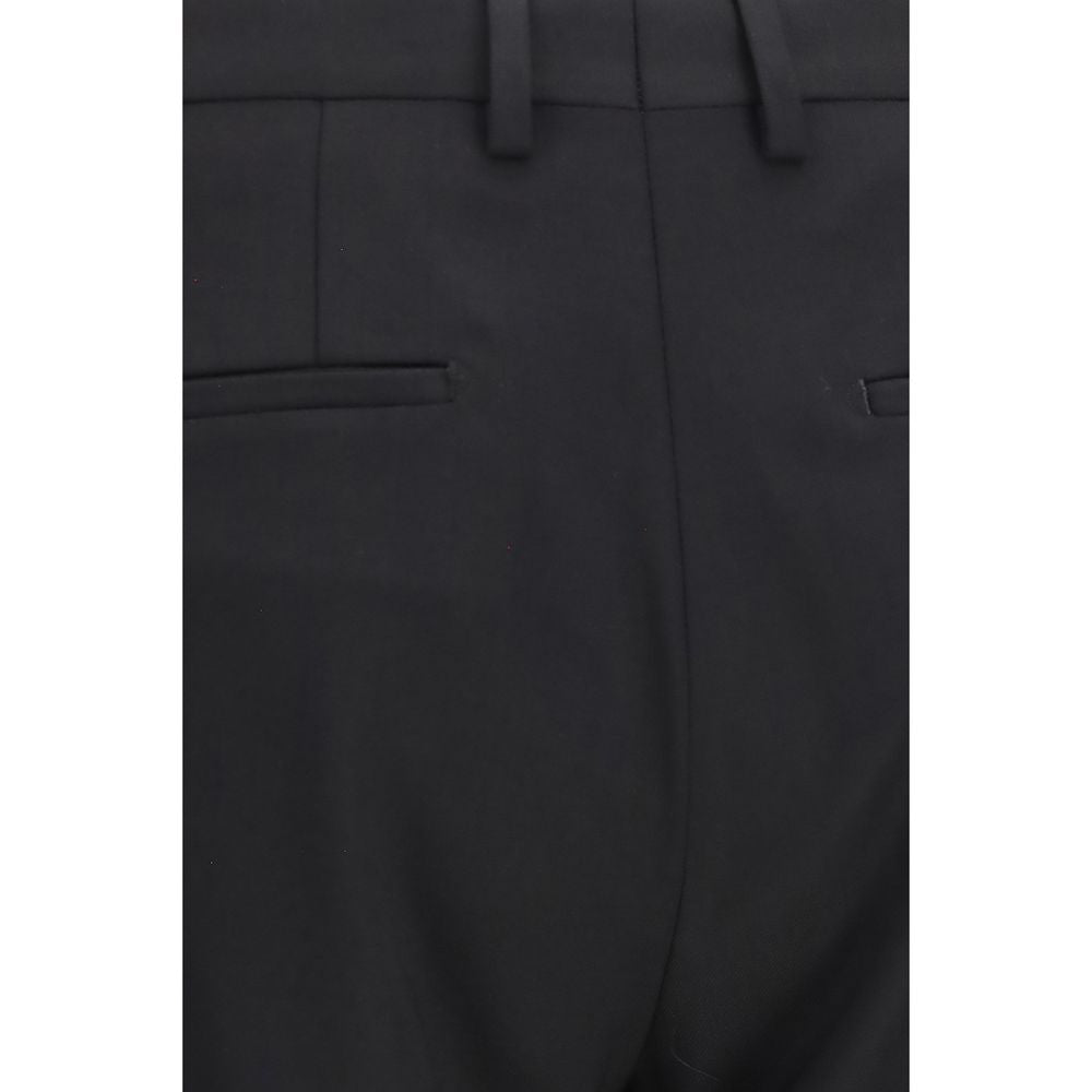 This Pant Suit by Dolce & Gabbana for men in virgin wool black presents a discerning silhouette, featuring a sophisticated and a discerning straight, regular-fit & cigarette for a refined and polished look.