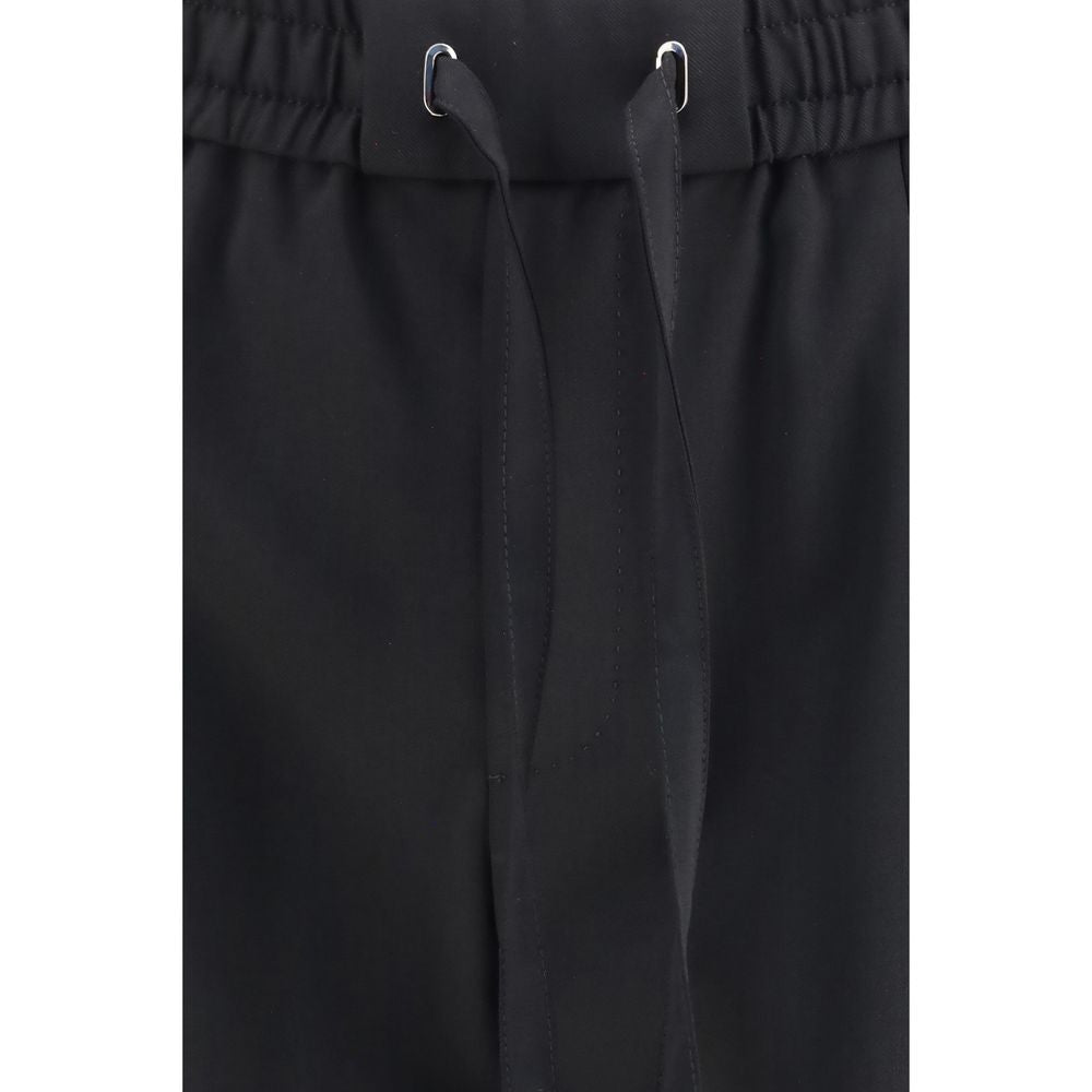 Joggers by Dolce & Gabbana for men in virgin wool black features an refined tailoring silhouette, showcasing a premium regular-fit with a and long cut for a refined tailoring look.