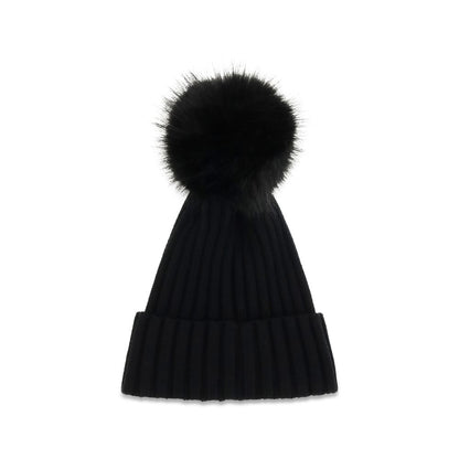 Beanie Hat by Moncler for women in virgin wool black features a refined silhouette, showcasing the refined design of the Virgin Wool Beanie Hat for a sophisticated look.