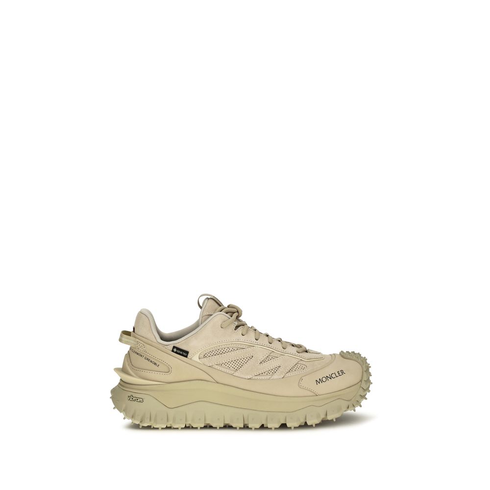 Athletic Sneakers by Moncler for men in eva tu & bos taurus nubuck calf leather beige presents a sleek silhouette, perfectly capturing the athletic style essence of Men's Athletic EVA TU & Bos Taurus Nubuck Calf Leather Sneakers with its sleek design and premium finish.
