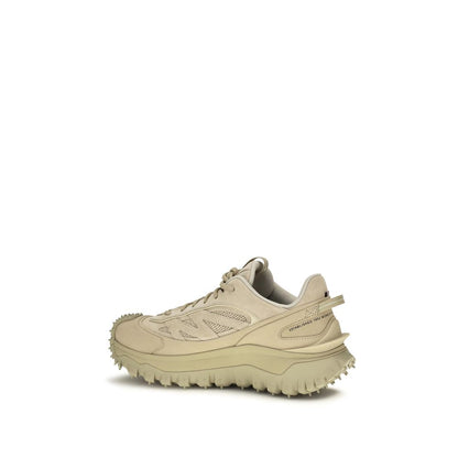 Athletic Sneakers by Moncler for men in eva tu & bos taurus nubuck calf leather beige showcases a architectural silhouette, artfully capturing the essence of the Men's Athletic EVA TU & Bos Taurus Nubuck Calf Leather Sneakers with its signature architectural athletic style construction.