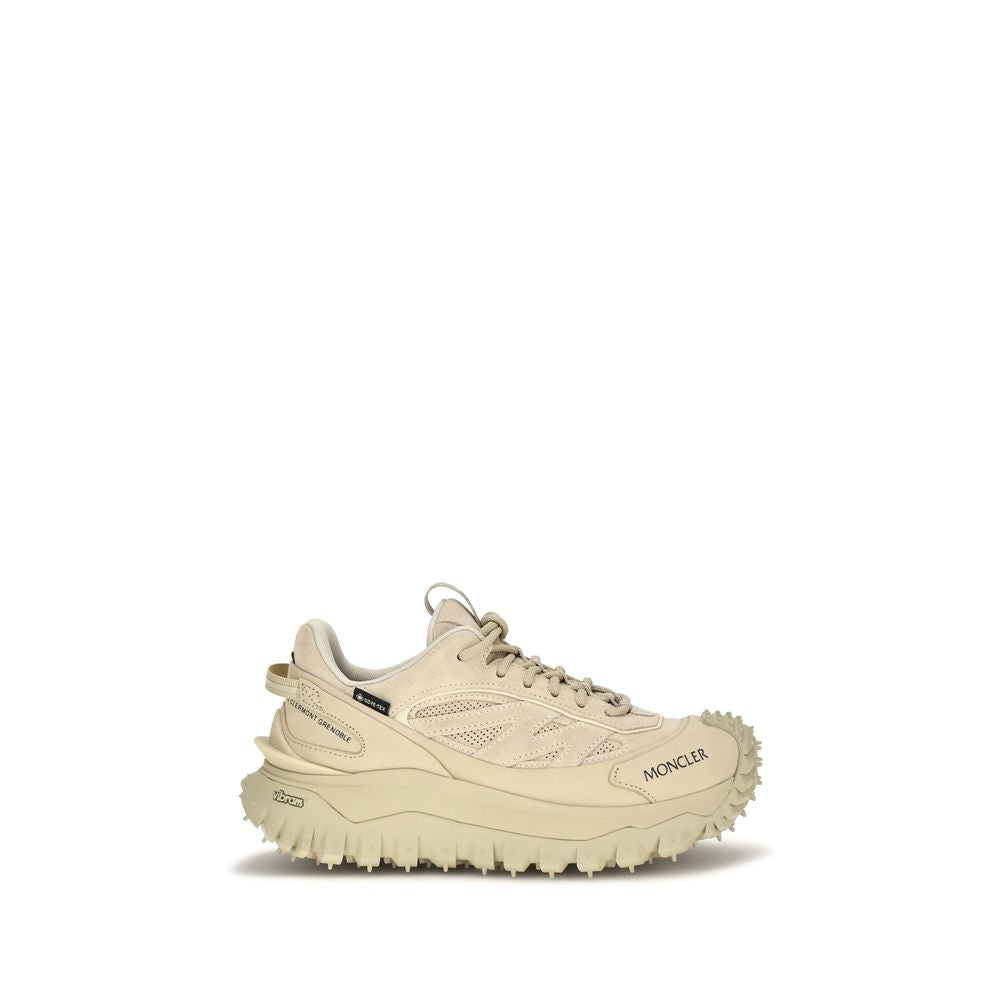 Athletic Sneakers by Moncler for women in eva tu & bos taurus nubuck calf leather beige showcases an impeccable silhouette, defined by an impeccable athletic style design that perfectly captures the essence of the Women's Athletic EVA TU & Bos Taurus Nubuck Calf Leather Sneakers.