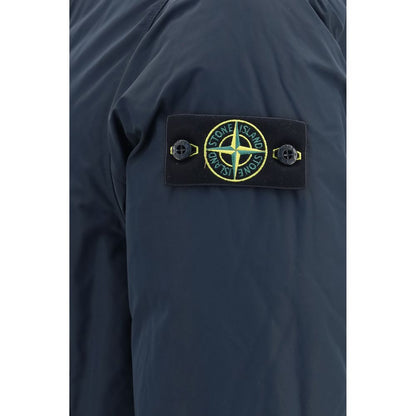 Hooded Puffer Jacket by Stone Island for men in polyester nylon & duck-down blue features a city-ready silhouette, detailed with pockets, hooded & insulated and a city-ready hooded neckline.