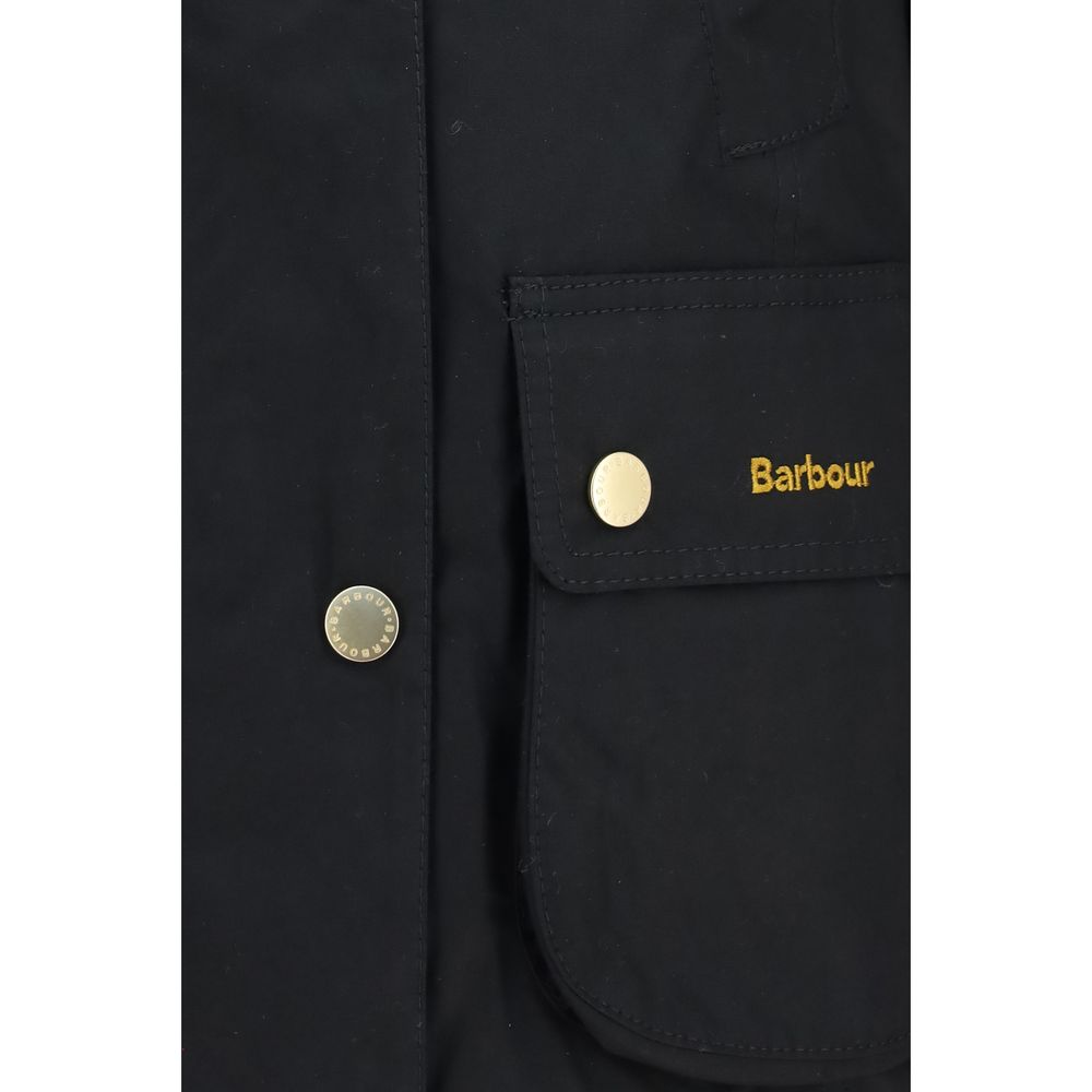 Overcoat by Barbour for women in cotton black & tartan features a cosy chic silhouette, artfully detailed with a sophisticated round neckline and premium pockets for a cosy chic finish.