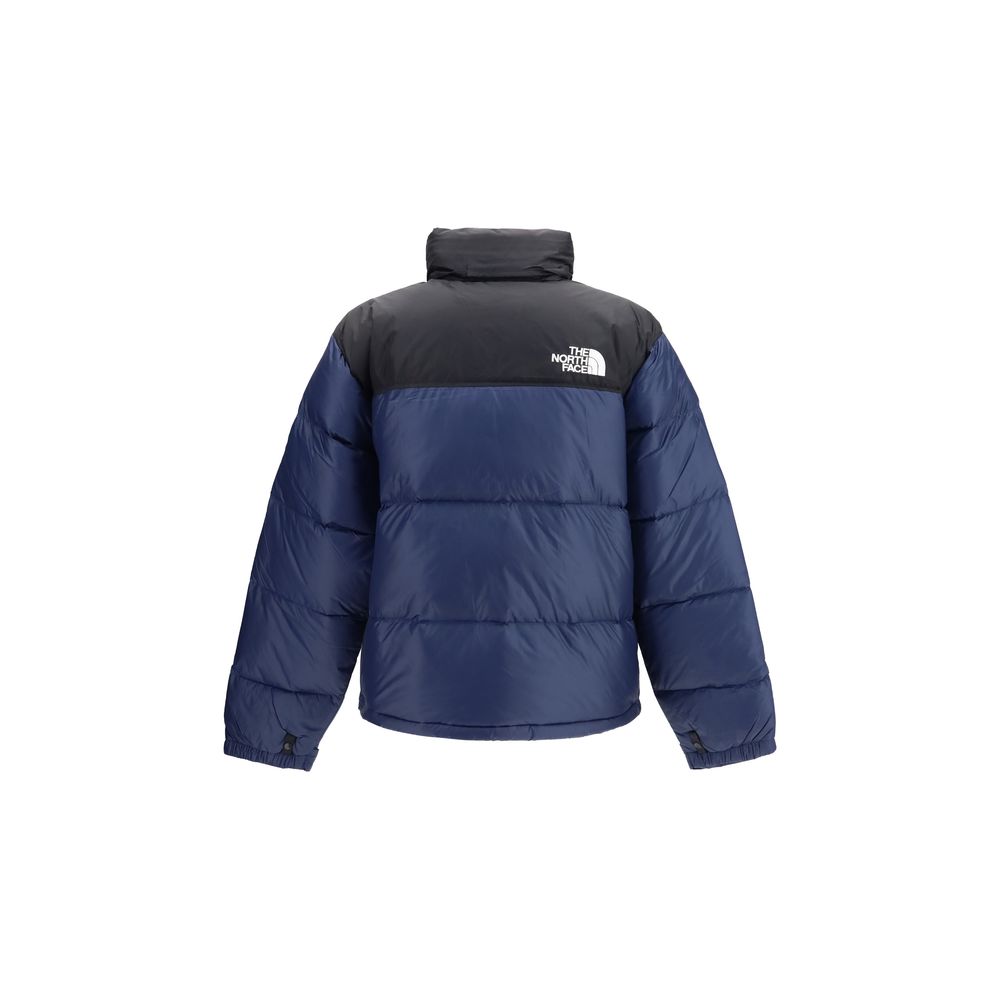 Hooded Overcoat by The North Face for men in nylon blue features an satoral silhouette, showcasing a sophisticated hooded neckline and satoral pockets, hooded & insulated for a premium, timeless look.