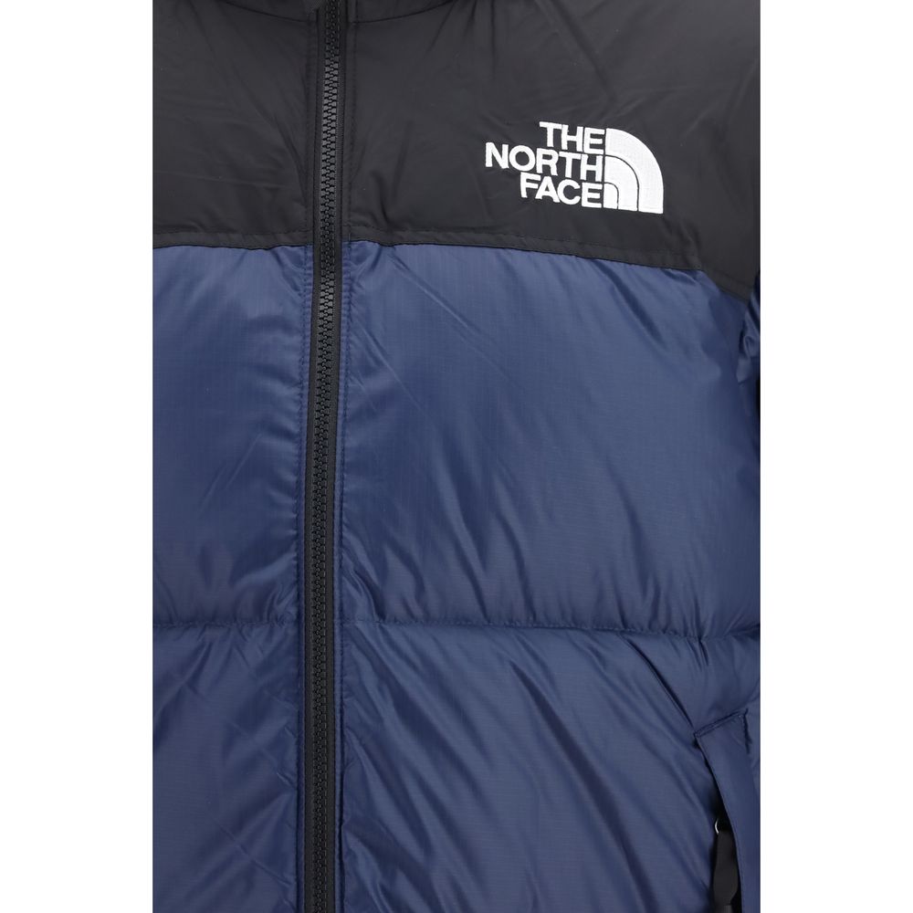 Hooded Overcoat by The North Face for men in nylon blue features a contemporary silhouette showcasing a contemporary and refined pockets, hooded & insulated for a sophisticated finish.