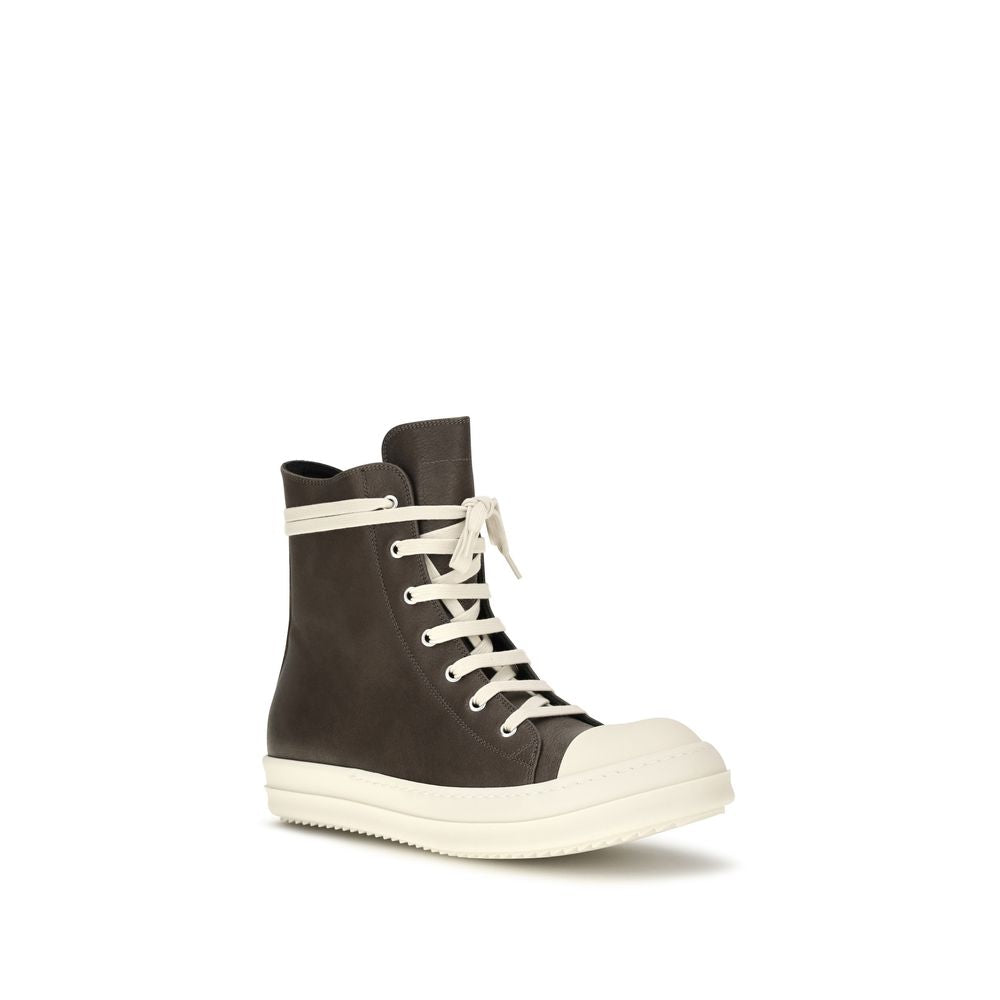 Sneakers by Rick Owens for men in bos taurus calf leather brown presents a sumptuous silhouette, artfully capturing the essence of the Men's High Top Bos Taurus Calf Leather Sneakers with its sumptuous high-top style design.