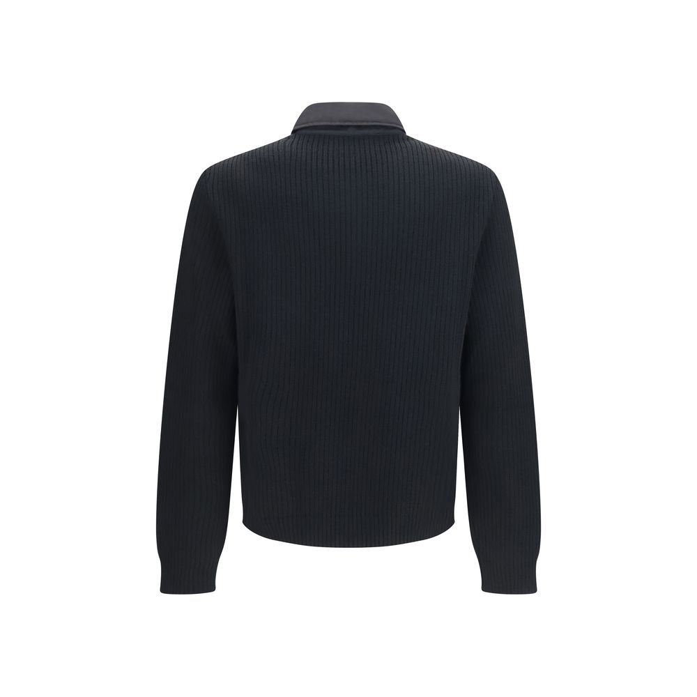 Overcoat by Prada for men in wool & nylon black features an satoral silhouette, showcasing a sophisticated and satoral pockets & insulated for a premium, timeless look.