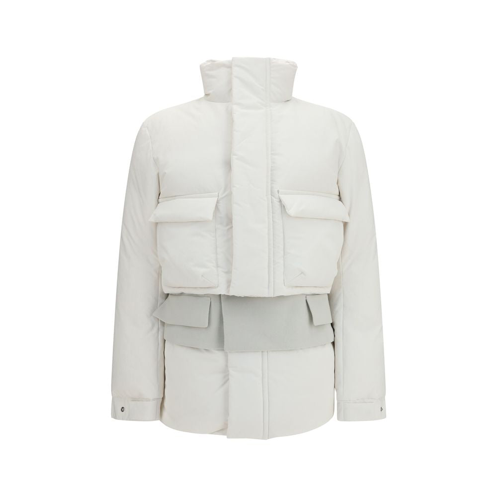 Overcoat by Sacai for women in polyester white features a cosy chic silhouette, artfully detailed with a sophisticated and premium pockets & insulated for a cosy chic finish.