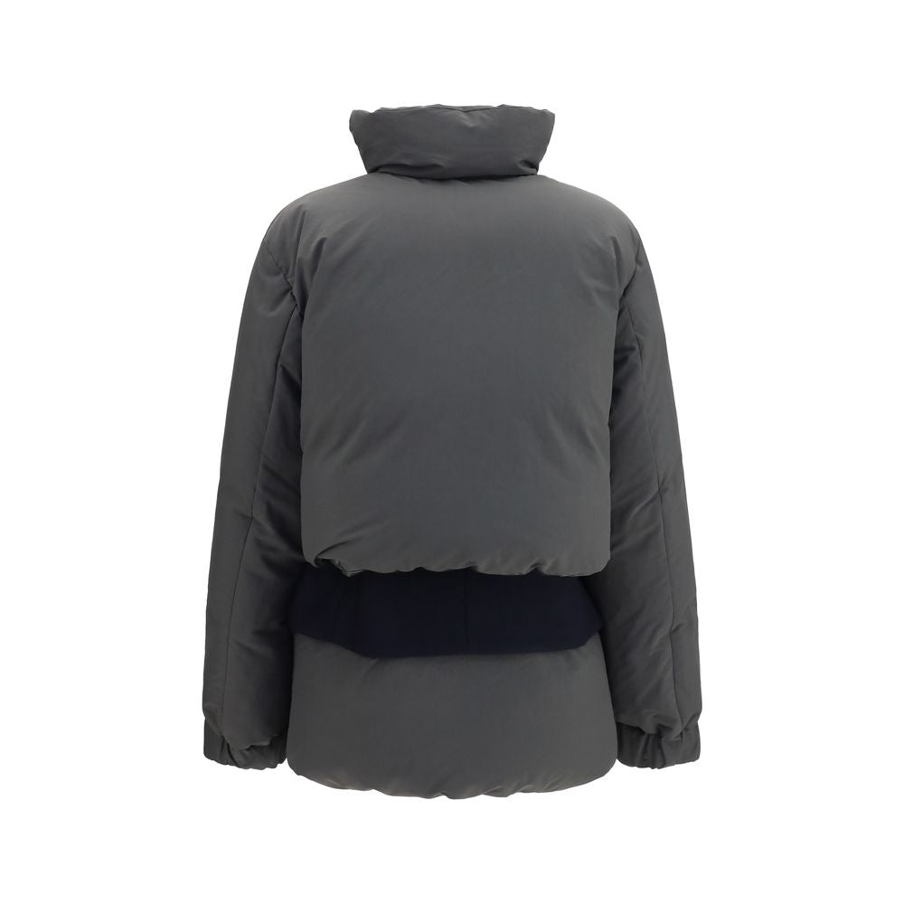 Overcoat by Sacai for women in polyester multicolor features a cosy chic silhouette, artfully detailed with a sophisticated and premium pockets & insulated for a cosy chic finish.