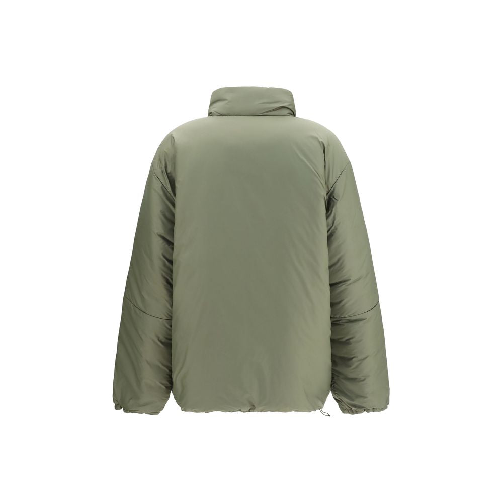 Puffer Jacket by Miu Miu for women in polyamide polyester cotton & goose-down bicolour features an on trend silhouette, showcasing refined pockets, insulated & windproof and a sophisticated high-collar neckline for a truly on trend finish.
