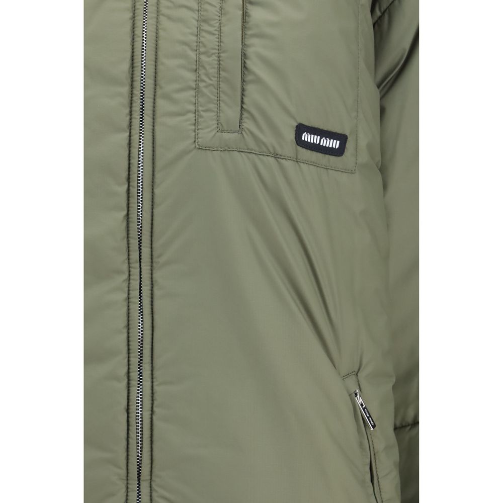 Puffer Jacket by Miu Miu for women in polyamide polyester cotton & goose-down bicolour features an contemporary silhouette, showcasing a sophisticated and contemporary pockets, insulated & windproof for a truly refined look.