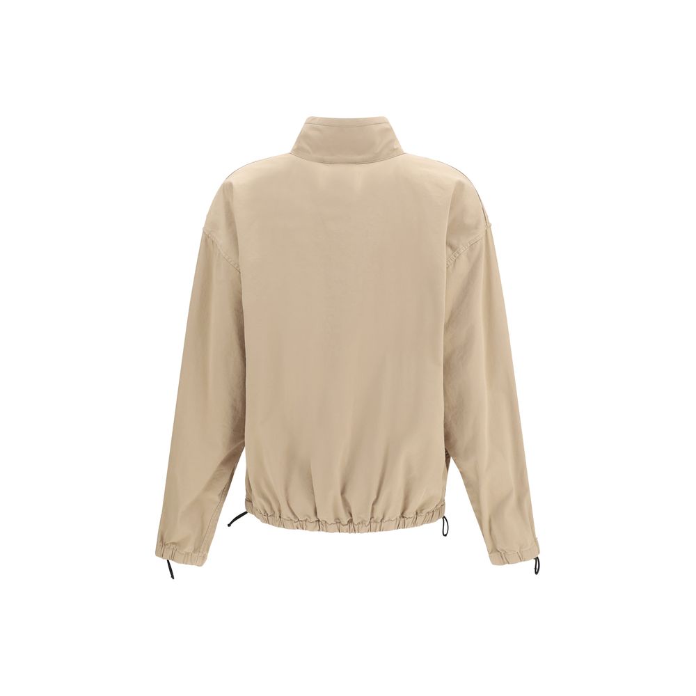 Overcoat by Miu Miu for women in cotton beige features an voluminous silhouette, showcasing distinct pockets and a voluminous shirt-collar neckline for a truly voluminous aesthetic.