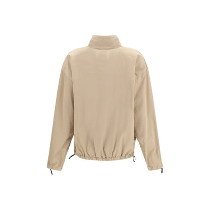 Overcoat by Miu Miu for women in cotton beige features an voluminous silhouette, showcasing distinct pockets and a voluminous shirt-collar neckline for a truly voluminous aesthetic.