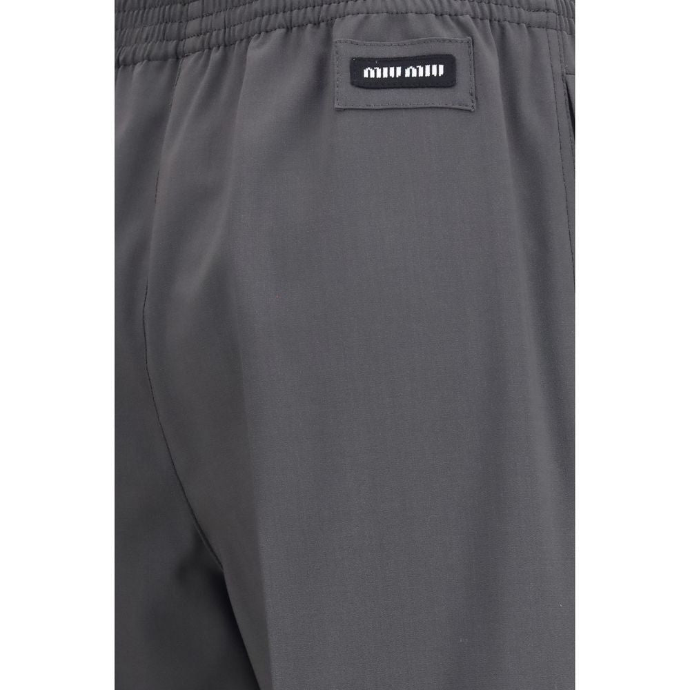 Casual Pants by Miu Miu for women in virgin wool gray features an refined tailoring silhouette, showcasing a premium straight-leg & regular-fit with a and long cut for a refined tailoring look.