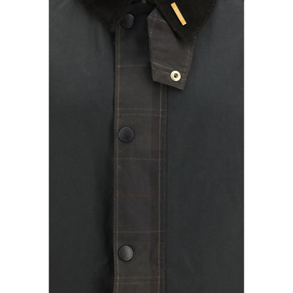 Overcoat by Barbour for men in cotton bicolour & tartan showcases a enveloping silhouette, detailed with distinctive pockets and a enveloping .