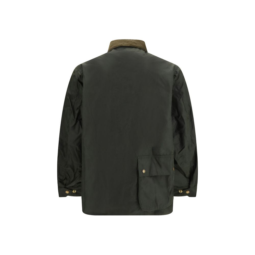 Overcoat by Barbour International for men in cotton corduroy bicolour showcases a architectural silhouette, artfully detailed with a distinctive and functional pockets for a architectural finish.