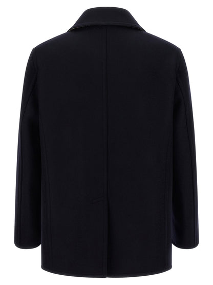 Overcoat by Burberry for men in wool blue, horn, patterned & signature showcases a enveloping silhouette, detailed with distinctive and a enveloping lapel neckline.