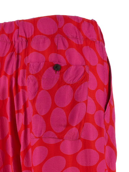 Trousers by Dries Van Noten for women in viscose fuchsia & patterned features an sartorial silhouette, showcasing a precise wide and long with a sartorial for a refined look.