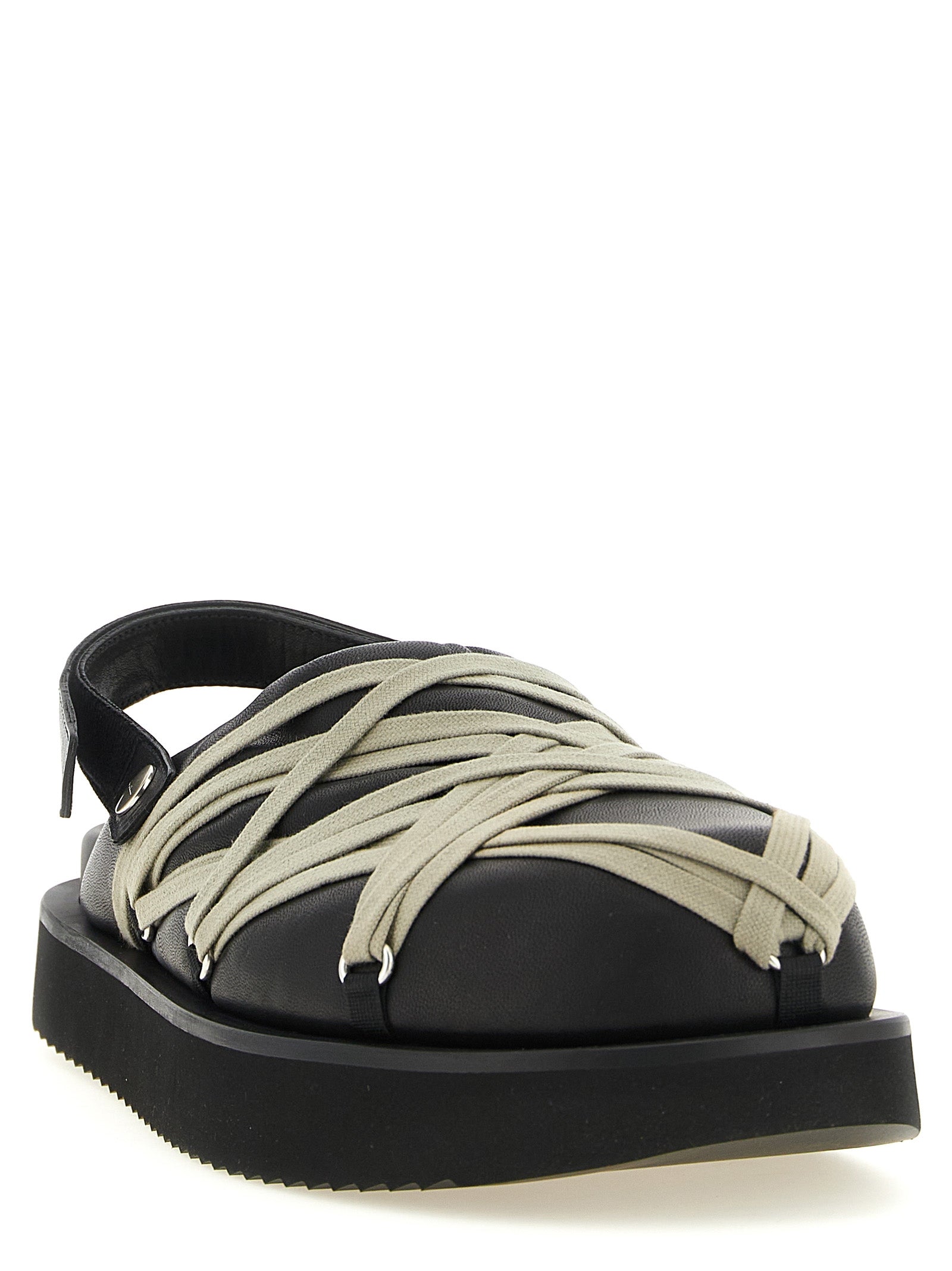 Platform Mule Mules Strap Shoes by Rick Owens for men in ramie & leather black & silver showcases a impeccable silhouette as Men's Ramie & Leather Platform Mule Mules Strap Shoes, artfully designed with a impeccable platform and refined for a impeccable finish.