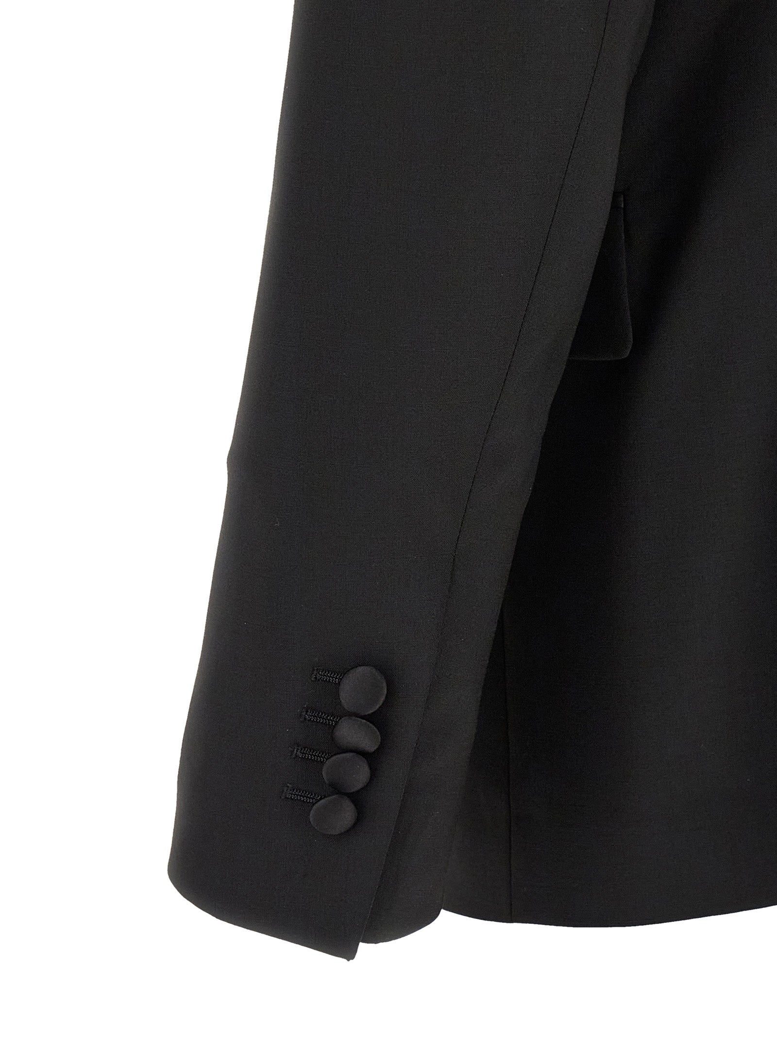Tuxedo by Lardini for men in virgin wool black presents a distinguished silhouette, showcasing a sophisticated and a distinguished straight-leg that epitomizes formal elegance.