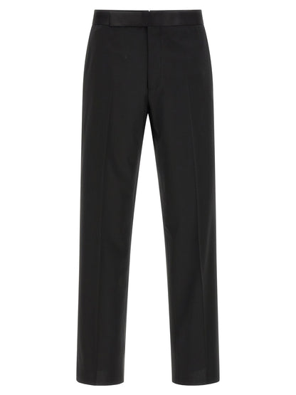 Tuxedo by Lardini for men in virgin wool black features an sharp silhouette with a sharp and a sharp straight-leg for a formal look.
