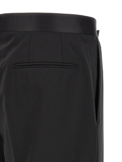 Tuxedo by Lardini for men in virgin wool black presents a sartorial silhouette, artfully finished with a sartorial and a sartorial straight-leg for a truly sophisticated look.