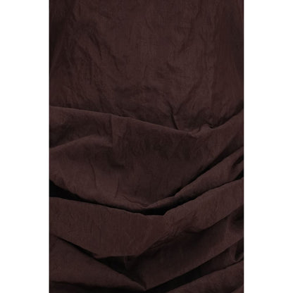 Dress by Magda Butrym for women in cotton brown presents a sinuous silhouette, showcasing a sophisticated and detailed with a sinuous short mini for a refined finish.