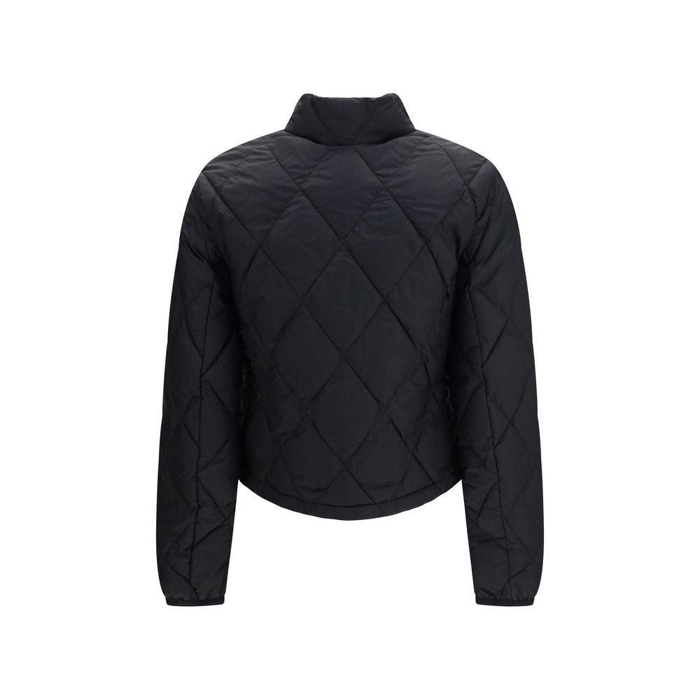Overcoat by Burberry for women in nylon & silicone black features a cosy chic silhouette, artfully detailed with a sophisticated and premium pockets for a cosy chic finish.