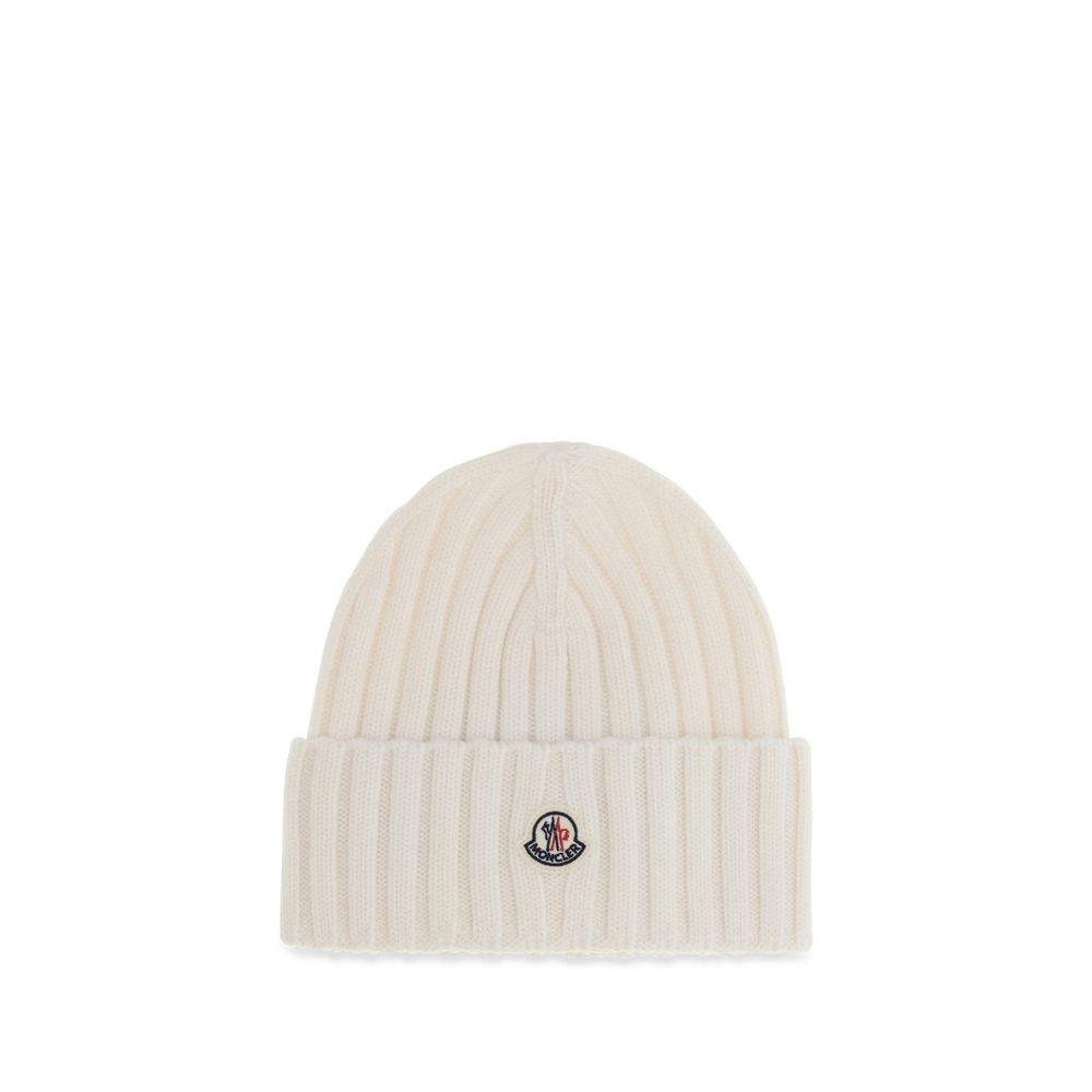 Beanie Hat by Moncler for women in merino wool white & signature presents a urban-chic silhouette, showcasing the urban-chic craftsmanship of this Merino Wool Beanie Hat.