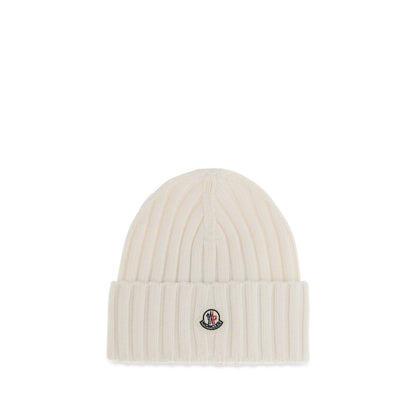 Beanie Hat by Moncler for women in merino wool white & signature presents a urban-chic silhouette, showcasing the urban-chic craftsmanship of this Merino Wool Beanie Hat.