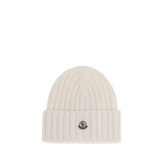 Beanie Hat by Moncler for women in merino wool white & signature presents a urban-chic silhouette, showcasing the urban-chic craftsmanship of this Merino Wool Beanie Hat.