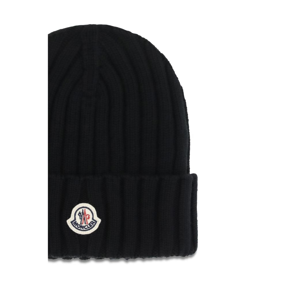 Beanie Hat by Moncler for women in merino wool black & signature presents a sleek silhouette, showcasing the sleek texture and refined craftsmanship of the Merino Wool Beanie Hat collection.