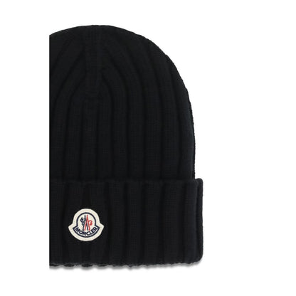 Beanie Hat by Moncler for women in merino wool black & signature presents a sleek silhouette, showcasing the sleek texture and refined craftsmanship of the Merino Wool Beanie Hat collection.