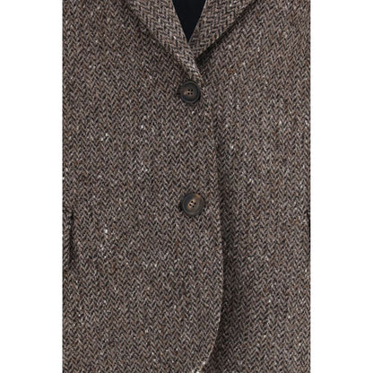Jacket by Brunello Cucinelli for women in virgin wool polyamide & viscose brown & herringbone presents a impeccable silhouette, showcasing distinct pockets and a impeccable for a sophisticated finish.