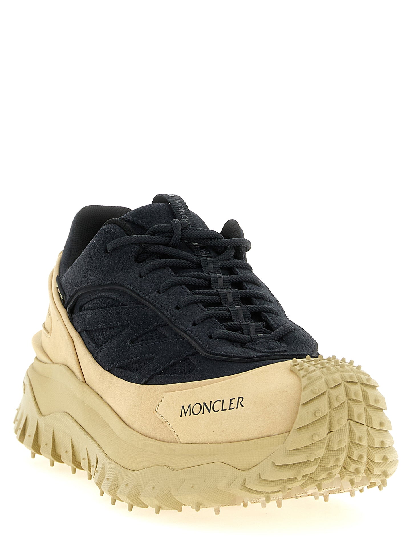 Athletic Sneakers Moncler men nubuck suede leather beige & navy featuring a avant-garde Men's Athletic Nubuck Suede Leather Sneakers design with a avant-garde athletic style for a refined finish.