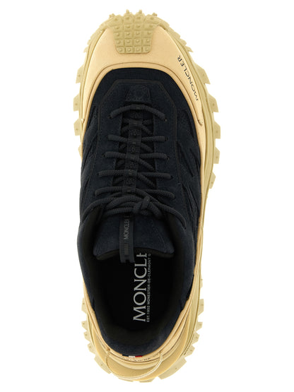 Athletic Sneakers by Moncler for men in nubuck suede leather beige & navy presents a sleek silhouette, perfectly capturing the athletic style essence of Men's Athletic Nubuck Suede Leather Sneakers with its sleek design and premium finish.