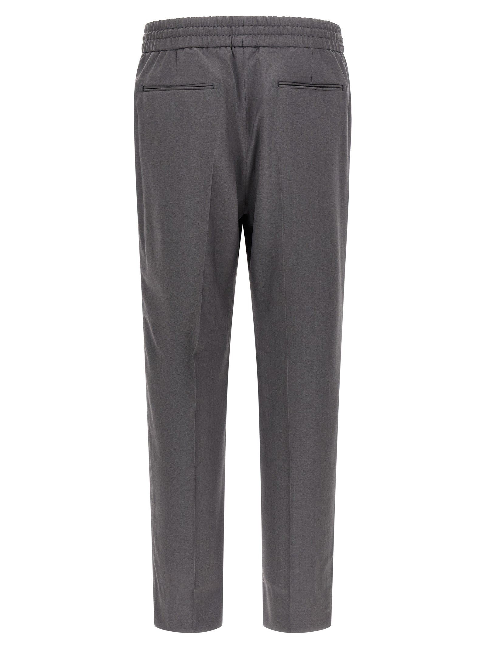 Trousers by Brioni for men in wool gray presents a perennial silhouette, meticulously tailored with a straight-leg cut, long finish, and an elegant .