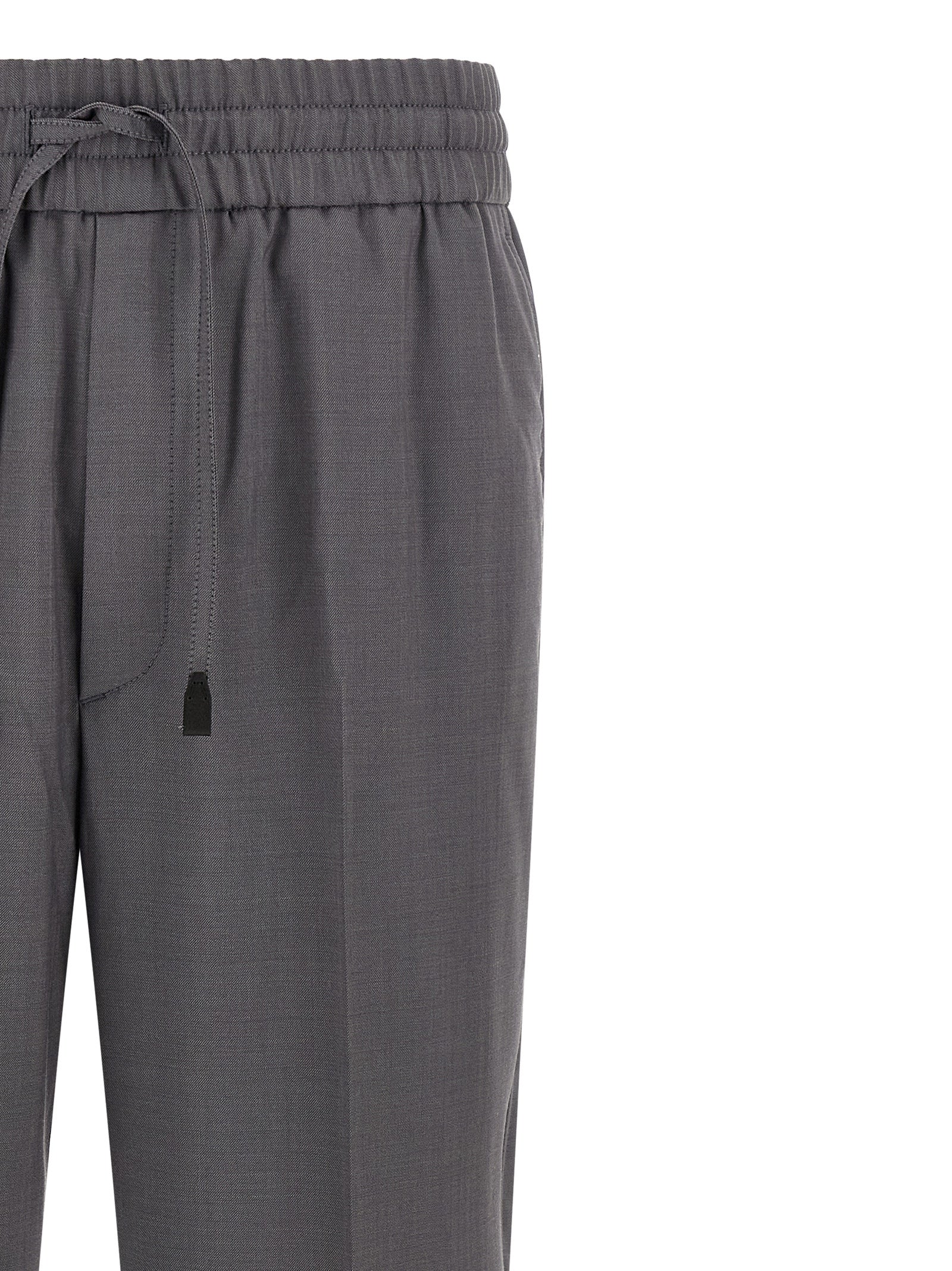 Trousers by Brioni for men in wool gray features an sartorial silhouette, showcasing a precise straight-leg and long with a sartorial for a refined look.