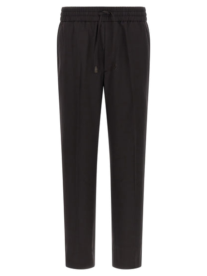 Trousers by Brioni for men in virgin wool brown features a tailored silhouette with a tailored straight, defined by its long and a sophisticated .