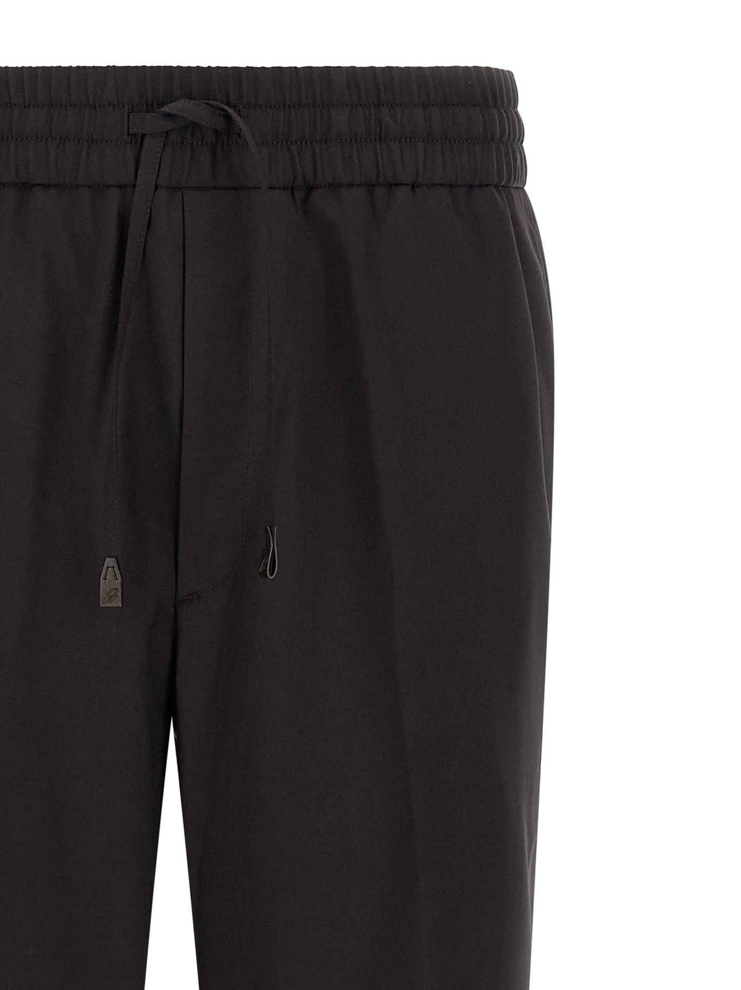 Trousers by Brioni for men in virgin wool brown features a artisanal silhouette, showcasing a sophisticated straight with a long and for a artisanal finish.