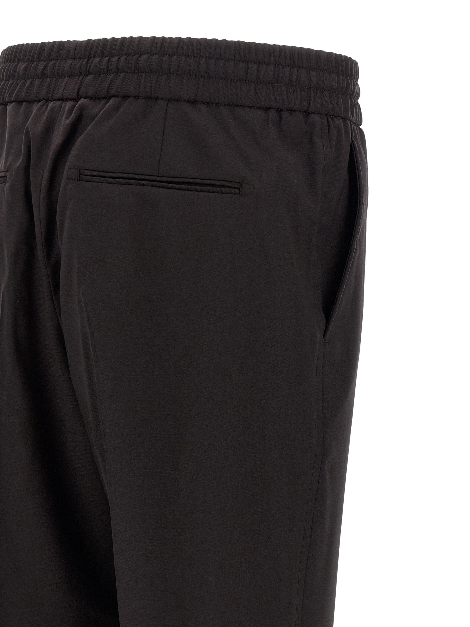 Trousers by Brioni for men in virgin wool brown features a tailored silhouette with a tailored straight, defined by its long and a sophisticated .