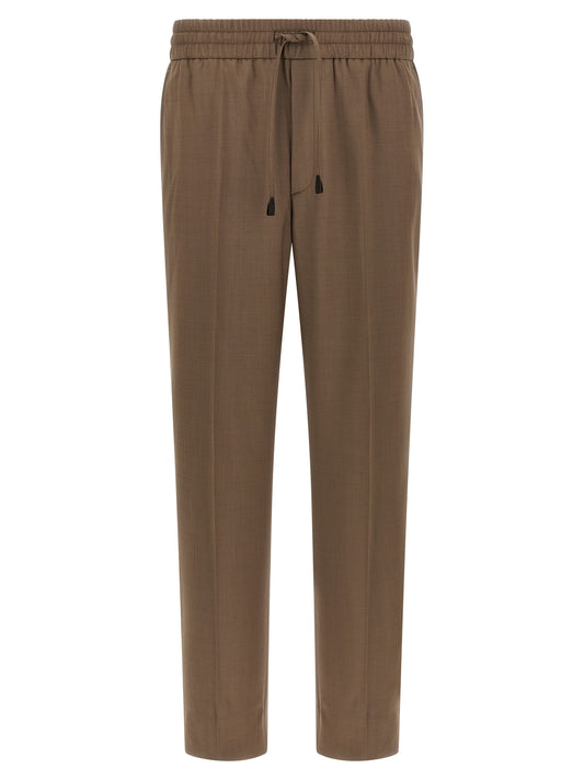 Trousers by Brioni for men in wool brown features an sartorial silhouette, showcasing a precise straight and long with a sartorial for a refined look.