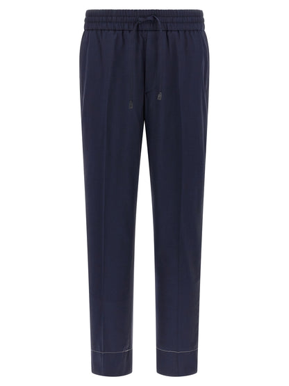 Trousers by Brioni for men in wool navy features a sculptural silhouette, showcasing a sculptural straight-leg and long with a sophisticated for a sculptural finish.